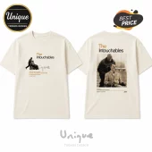 Off-white cotton t-shirt with The Intouchables movie graphic, featuring scenes of the two leads on front and back.!