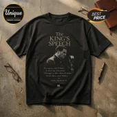 Black cotton t-shirt featuring King George VI graphic, vintage microphone, and quote text on a concrete surface.!