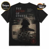 Black graphic t-shirt featuring The Lives of Others film art, a man with headphones, reel-to-reel tape, and Berlin imagery.!
