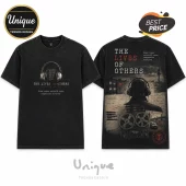 Black vintage-wash t-shirt with The Lives of Others movie print, headphones, reel-to-reel recorder, and East Berlin motifs.!