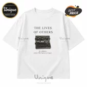 White short-sleeve cotton t-shirt featuring a vintage reel-to-reel tape recorder graphic with movie quote text.!