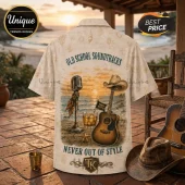Beige button-up shirt featuring a vintage microphone, acoustic guitar with cowboy hat, and text Old School Soundtracks.!