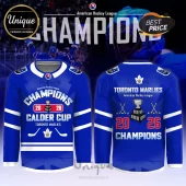 Front and back of blue Toronto Marlies 2026 Calder Cup Champions hockey jersey with white stripes and team logos.!