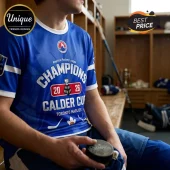 Toronto Marlies blue hockey jersey featuring 2026 Calder Cup Champions graphics and American Hockey League logo.!