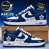 Toronto Marlies themed sneakers in blue and white leather with custom name text and team logo on a cardboard box.!