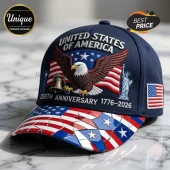 Navy blue baseball cap with embroidered eagle, Liberty Bell, Statue of Liberty, and 250th anniversary text on brim.!