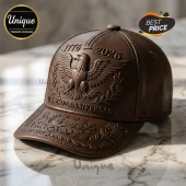 Brown leather baseball cap featuring an embossed American eagle, 1776-2026, and U.S. 250th Anniversary text.!