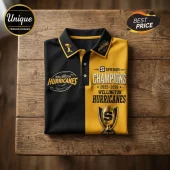 Wellington Hurricanes rugby polo shirt, black and yellow, featuring 2025-2026 champions text and a gold trophy graphic.!