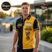 Man wearing black and yellow Wellington Hurricanes 2025-2026 Super Rugby Champions polo shirt outdoors.!