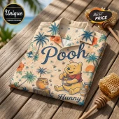 Winnie the Pooh Hawaiian shirt with tropical palm trees, hibiscus flowers, and honey pots on a beige background.!