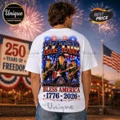 White t-shirt showing ZZ Top members, American flag graphics, fireworks, and Bless America 1776-2026 text on back print.!