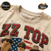 Beige cotton t-shirt featuring ZZ Top band members, American flag graphic, and distressed red text on patterned fabric.!