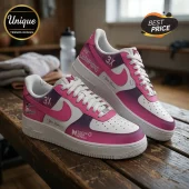 Custom pink and white Suncorp Super Netball sneakers with Champions 3X text and personal name space on wooden bench.!