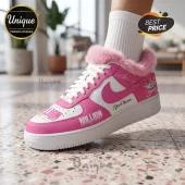 Custom pink and white leather sneaker with faux fur trim, white laces, and Million Dollar Babe text on a tiled floor.!