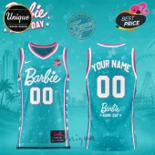 Teal and pink Indiana Fever basketball jersey featuring Barbie branding, white star patterns, and customizable number 00.!