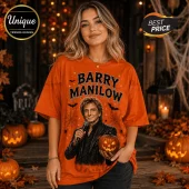 Barry Manilow Life Is Scary Without Halloween T-Shirt in bright orange cotton featuring a singer graphic and spiderwebs.