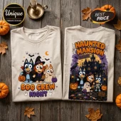 Bluey Boo Crew Halloween T-Shirt featuring cartoon dogs in costumes, jack-o'-lanterns, and a haunted mansion graphic.