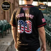 Black custom baseball jersey with American flag print on numbers, 'YOUR NAME' text, 250 logo, and MLB patch on back.!