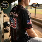 Custom black baseball jersey featuring an American flag pattern on the back numbers, player name text, and sleeve patch.!