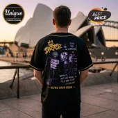 Black baseball jersey with Dizzee Rascal graphic, yellow crown, and text reading Grime is not just music AU/NZ Tour 2026.!