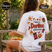 White oversized t-shirt with lace sleeve trim featuring Doritos tortilla chips, salsa, and text I have a Doritos addiction.!
