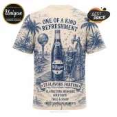 Dr Pepper Vintage Logo Blue Limited Edition T-Shirt featuring a bottle, soda glass, and tropical palm tree background.