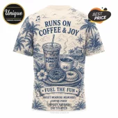 Dunkin Donuts Coffee and Donuts Limited Edition T-Shirt featuring blue tropical illustrations on a cream fabric background.