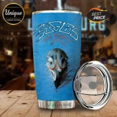 Blue stainless steel tumbler featuring The Eagles Greatest Hits album art with an eagle skull graphic and metal lid.!