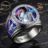 Silver Elvis Presley commemorative ring featuring a circular portrait, TCB lightning bolt logo, and blue crystals.!