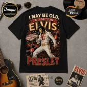 Elvis Presley Vintage Las Vegas Concert T-Shirt featuring Elvis in a white jumpsuit against a neon Las Vegas backdrop.