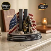 Firefighter Memorial Acrylic Plaque featuring a kneeling firefighter, the Twin Towers, and an American flag on a base.