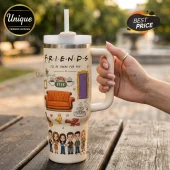 Friends themed stainless steel tumbler with straw featuring the Central Perk logo, orange couch, and character icons.!