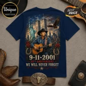 George Strait 9-11 Memorial Patriotic T-Shirt featuring the singer, Statue of Liberty, eagle, and text on navy blue fabric.