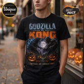 Godzilla vs Kong Halloween 2026 black t-shirt featuring graphic art of the titans, carved pumpkins, and a full moon.