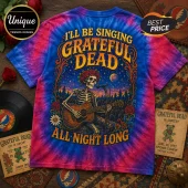 Grateful Dead Skull and Roses Tie Dye T-Shirt featuring a skeleton playing acoustic guitar in a vibrant, cosmic design.