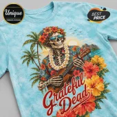 Grateful Dead Steal Your Face floral t-shirt with a tropical skeleton playing a ukulele on a light blue tie-dye fabric.