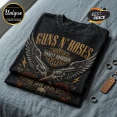 Black acid-wash t-shirt with Guns N' Roses and Harley-Davidson graphic, featuring revolvers, wings, roses, and skull.!