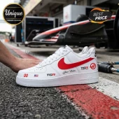 Haas F1 Team White Custom Nike Air Force 1 Sneakers featuring red Nike swooshes, TGR logos, and a US flag design.