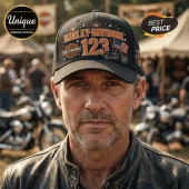 Harley-Davidson 123rd Anniversary Black Baseball Cap featuring embroidered gold 123 text, motorcycle graphic, and flag.