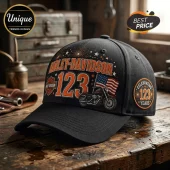 Harley-Davidson 123rd Anniversary black baseball cap with motorcycle, American flag, and commemorative orange lettering.