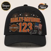 Harley-Davidson 123rd Anniversary black baseball cap with orange 123 branding, motorcycle graphic, and US flag icon.