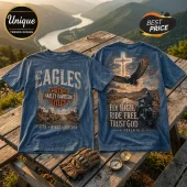 Blue vintage-wash t-shirt with Harley-Davidson Eagles graphic, cross, motorcycle, and text reading Fly High, Ride Free.!