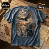 Blue vintage-wash t-shirt with eagle, cross, and motorcyclist graphic featuring text Fly High, Ride Free, Trust God.!