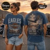 Blue vintage-wash t-shirt with Harley-Davidson logo, eagle, cross, and Psalm 91:11 text on a desert road background.!