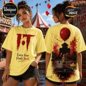 Bright yellow cotton t-shirt with Pennywise horror graphic, red balloon, and Every Fear Floats Back text on front and back.!