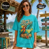 Jimmy Buffett Turquoise Margaritaville T-Shirt featuring a parrot, margarita glass, and sunset graphic on cotton fabric.