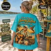 Jimmy Buffett Turquoise Margaritaville T-Shirt featuring a graphic of the singer playing guitar on a beach background.