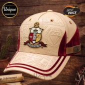 Cream-colored Kappa Alpha Psi baseball cap with a prominent fraternity crest, embossed patterns, and maroon velvet accents.!