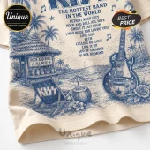 KISS The Hottest Band Retro T-Shirt featuring a blue ink beach scene with a guitar, palm trees, and song titles on cream.