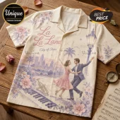 Cream-colored button-up shirt featuring La La Land characters dancing, city skyline, piano keys, trumpet, and floral motifs.!